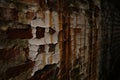 Peeling paint and weathered brick wall texture with streaks of rust Royalty Free Stock Photo
