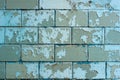 Peeling painted blue tiles on the plinth Royalty Free Stock Photo