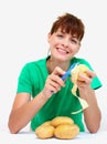 Peeling potato Royalty Free Stock Photo