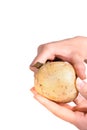 Peeling potatoes Royalty Free Stock Photo