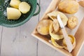 Peeling potatoes Royalty Free Stock Photo