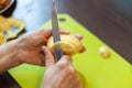 Peeling potatoes close up