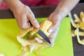 Peeling potatoes close up