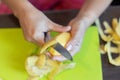 Peeling potatoes close up