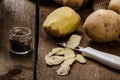 Peeling potatoes for gnocchi dougn on Royalty Free Stock Photo