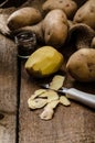 Peeling potatoes for gnocchi dougn on Royalty Free Stock Photo