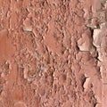 Peeling red paint on a wooden surface. Abstraction. Royalty Free Stock Photo