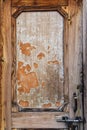 Peeling varnish on an old wooden door