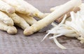 Peeling, white asparagus Royalty Free Stock Photo