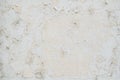 Peeling white old paint on an white cement wall texture for background and design art work Royalty Free Stock Photo