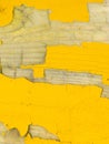 Peeling yellow paint on wood Royalty Free Stock Photo