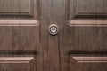 Peephole door eye look hole from spy security, safety close-up Royalty Free Stock Photo