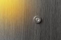 Peephole door eye look hole from spy security, safety close-up Royalty Free Stock Photo