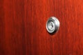 Peephole on wooden door