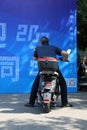 Peering at students\' signatures on the commemorative board, opening ceremony for freshmen, Central South University, China