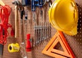 Peg board with tools and hard hat