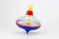 Peg-top spinning isolatred in white background. Royalty Free Stock Photo