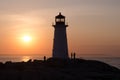 Peggy`s Cove Lighthouse at sunset Royalty Free Stock Photo