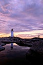 Lighthouse sunset water reflect Royalty Free Stock Photo