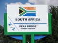 Peka Bridge border post control sign