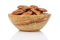 Pekan nuts in wood bowl Royalty Free Stock Photo