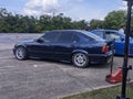 Pekanbaru, Indonesia - 05-28-2023: BMW E36 in Navy, getting ready for Drive racing. BMW E36 on the parking lot. Editorial photo.
