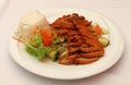 Peking duck Chop Suey with steamed rice close up Royalty Free Stock Photo