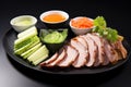 peking duck with cucumber and carrot slices