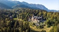 Peles Castle in broad daylight and view from above, Sinaia, Prahova Valley, Romania.