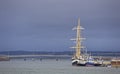 The Pelican of London a Class A Tall Ship sheltering alongside the quay Montrose with the Road and Rail Bridges in the background. Royalty Free Stock Photo