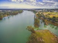 Pelicans relaxing on the grass shores of Murray River. Royalty Free Stock Photo