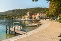 Lakeside promenade in ancient village Pella on the shore of Lake Orta in Piedmont, Italy Royalty Free Stock Photo