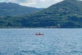 Pella - 07/12/2020: red canoe in Orta`s lake Royalty Free Stock Photo