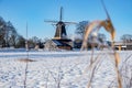 Pelmolen Ter Horst, Rijssen covered in snowy landscape in Overijssel Netherlands, historical wind mill during winter Royalty Free Stock Photo