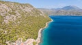 Peloponnese, Greece Aerial view on turqouise blue water and sandy beach. Limni Vouliagmeni or Ireon Lake,