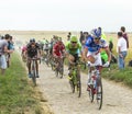 The Peloton on a Cobblestone Road - Tour de France 2015