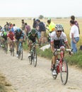 The Peloton on a Cobblestone Road - Tour de France 2015