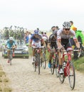 The Peloton on a Cobblestone Road - Tour de France 2015