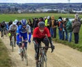 The Peloton on a Dirty Road - Paris-Nice 2016