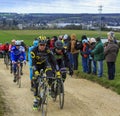 The Peloton on a Dirty Road - Paris-Nice 2016