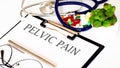 PELVIC PAIN text and Background of Medicaments, Stethoscope Royalty Free Stock Photo
