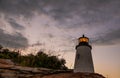 Pemaquid Point Lighthouse at sunset during a calm summer evening in Bristol, Maine Royalty Free Stock Photo