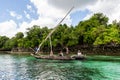 Dhow - wooden swahili culture tradiotional boat with local fisherman on the coast of Pemba Island, Indian Ocean. Royalty Free Stock Photo