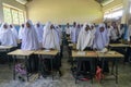 PEMBA ISLAND, ZANZIBAR, TANZANIA - JANUARY 2020: School girls and School Boys in the Ordinary class room Royalty Free Stock Photo