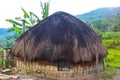 pembangkit listrik tenaga matahari honai rumah tradisional papua, lokasi di pegunungan tengah papua indonesia