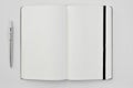 Pen and blank notepad on a white table Royalty Free Stock Photo