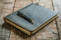 Pen on Book Wooden Table Royalty Free Stock Photo