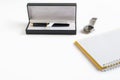 Pen in box with empty book and clock watch Royalty Free Stock Photo