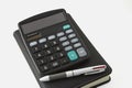 Pen and calculator and notebook Royalty Free Stock Photo