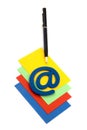 Pen with email symbol on a pile of cards